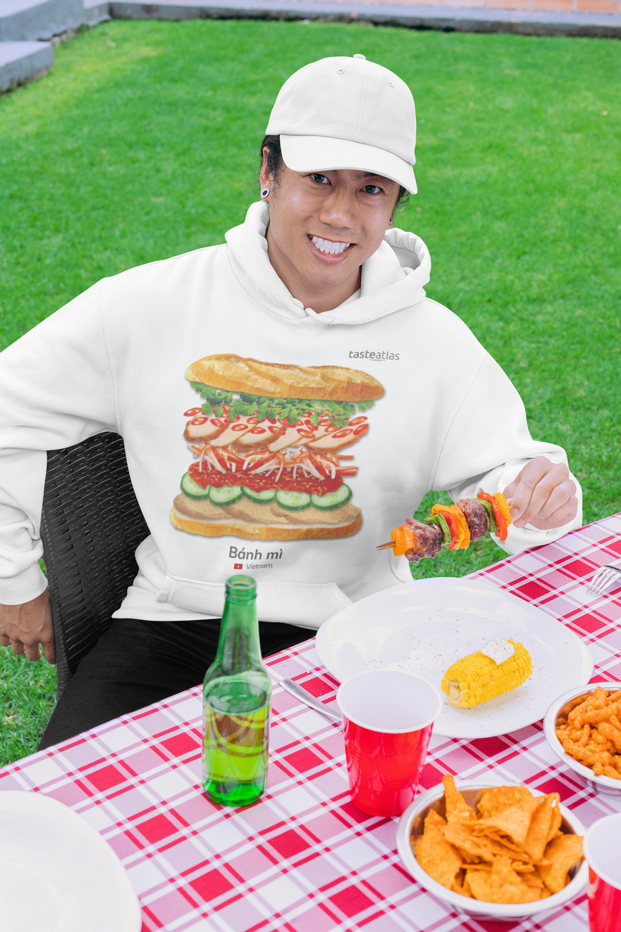 a man on the picnic wearing banh mi hoodie