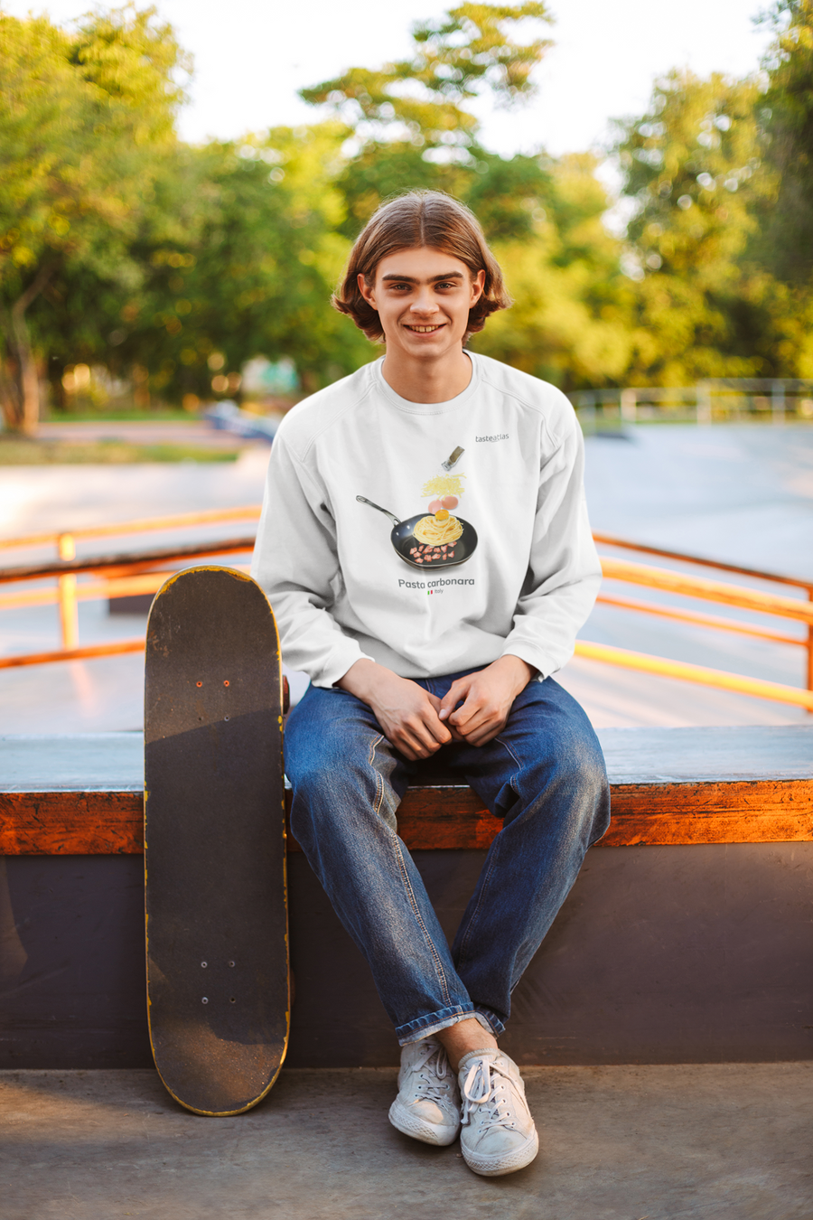 skater wearing  pasta carbonara sweatshirt