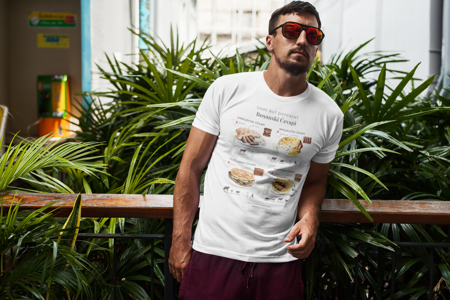 a man with sunglasses leaning on a fence wearing same but different bosanski ćevapi t-shirt