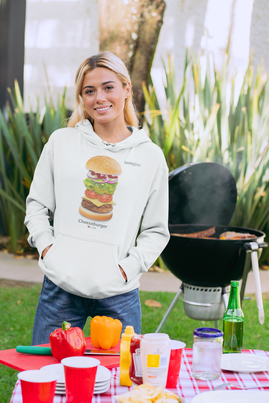 woman by the barbecue wearing cheeseburger hoodie