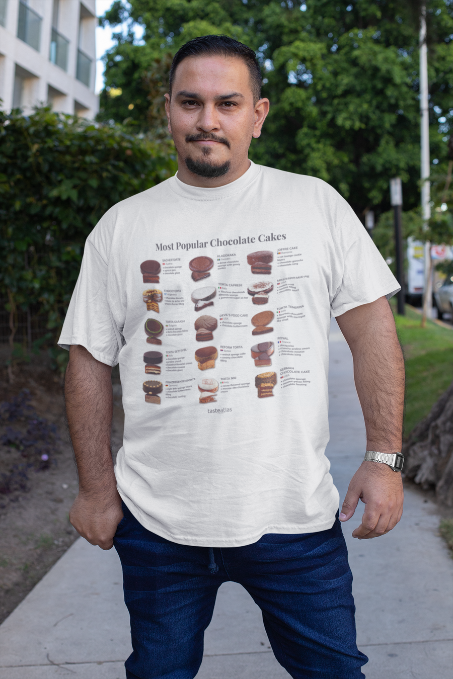 man standing on a pavement wearing most popular chocolate cakes t-shirt