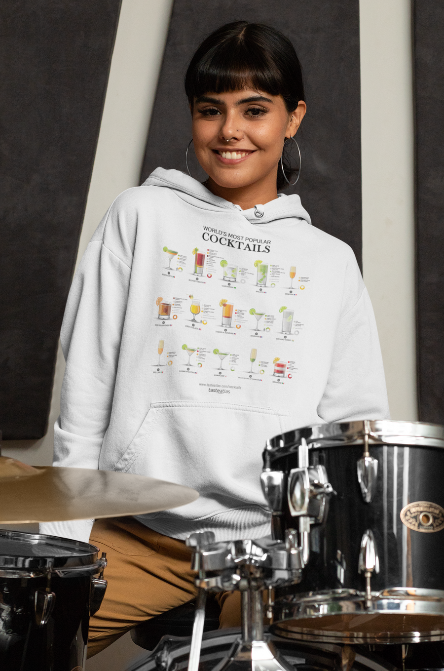 woman with drums wearing world's most popular cocktails hoodie