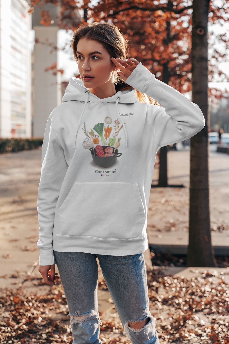 woman on the street with a consomme hoodie