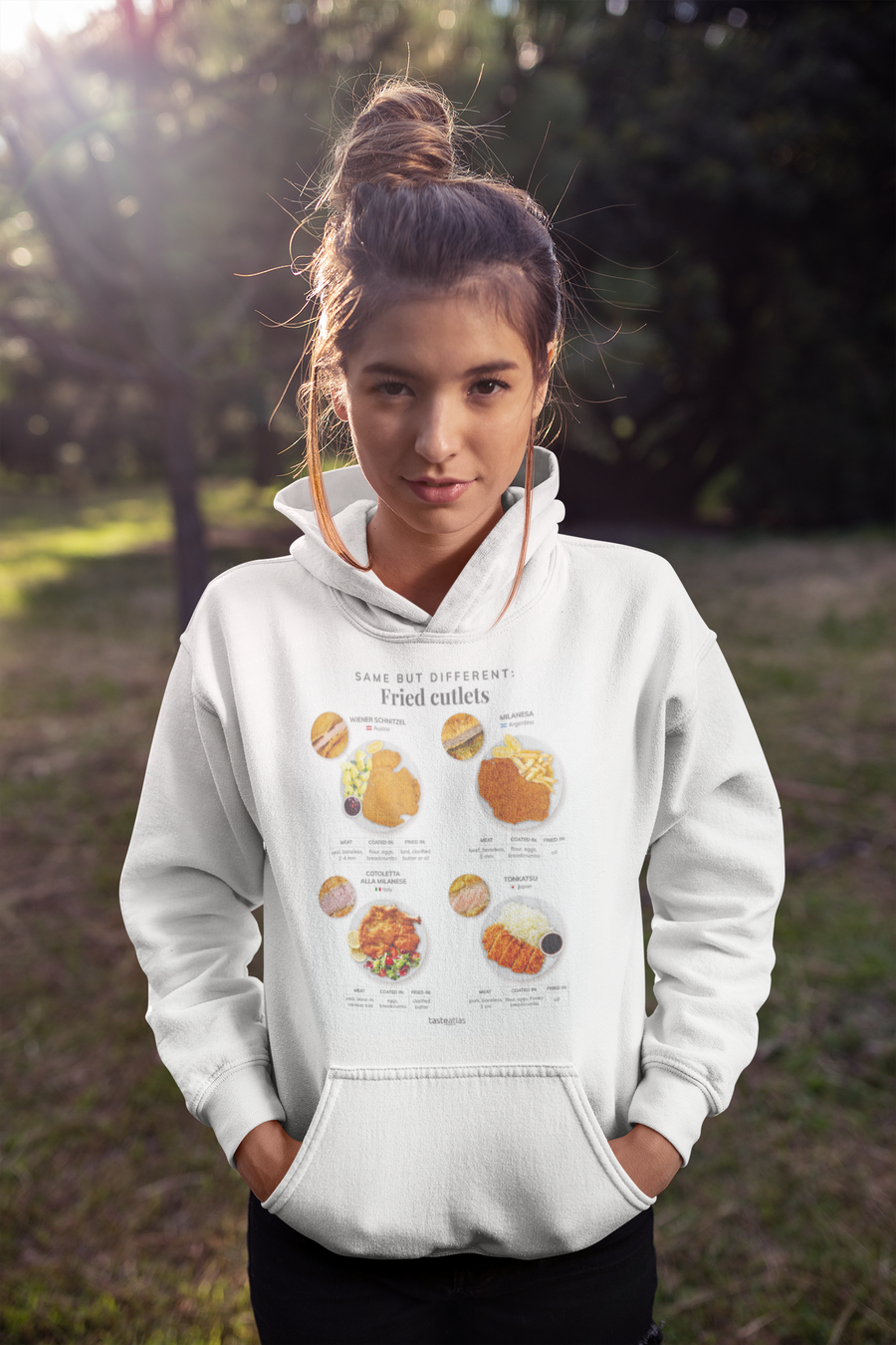 woman in a park wearing same but different fried cutlets hoodie