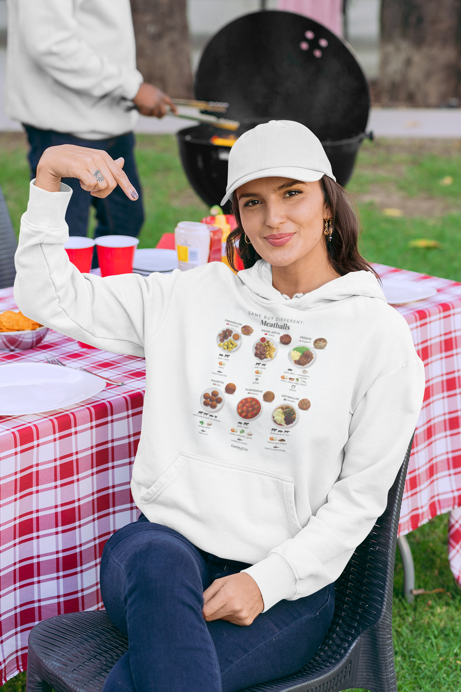 woman at the picnic wearing same but different meatballs hoodie