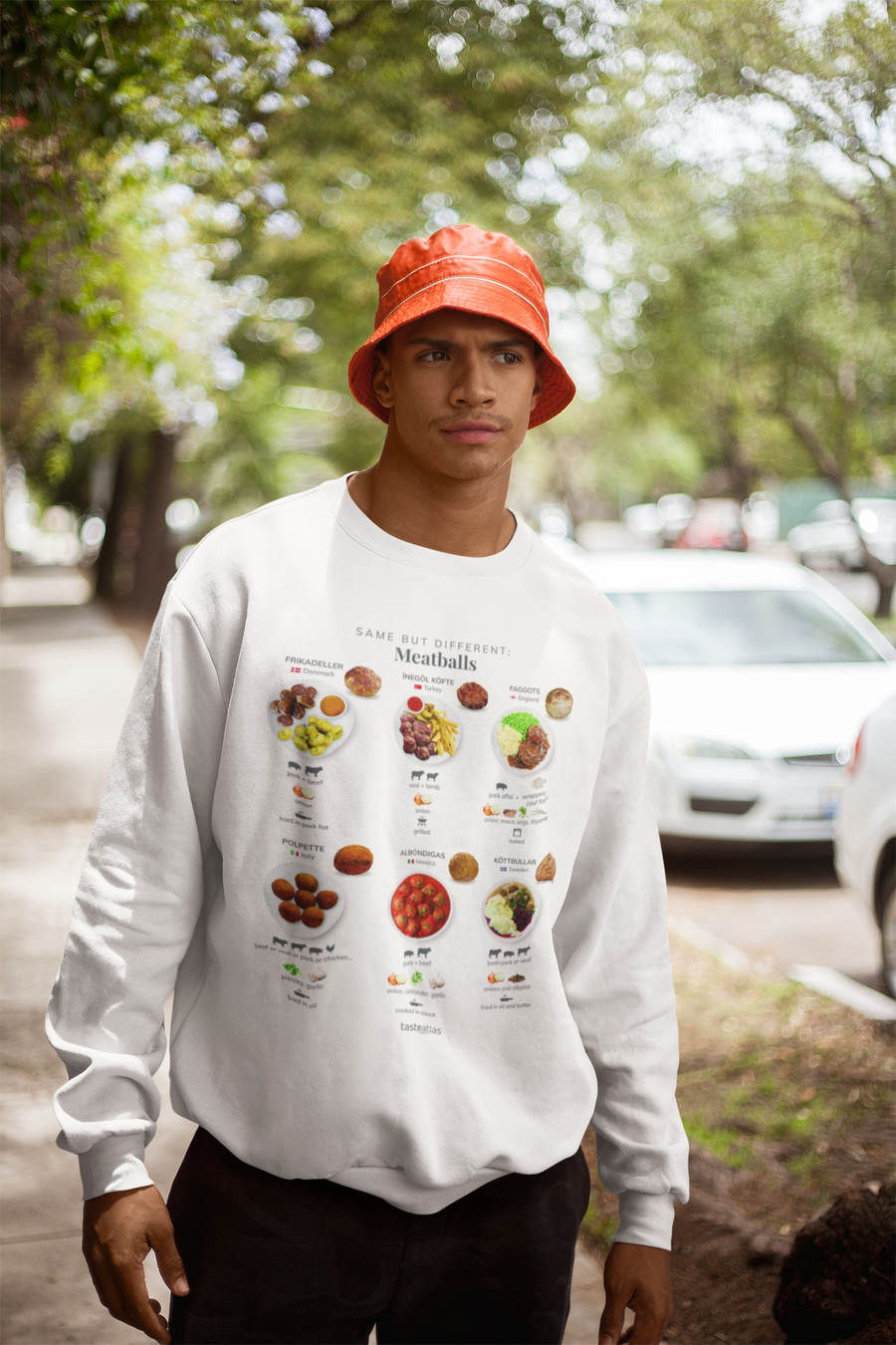 man on a sidewalk wearing same but different meatballs sweatshirt