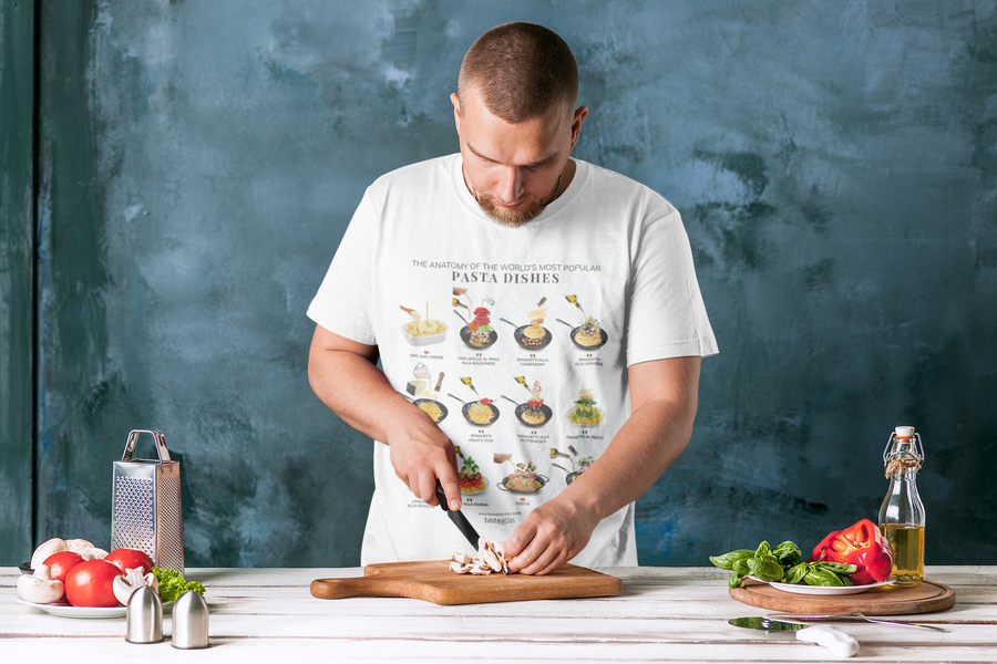 man cooking wearing the anatomy of the world's most popular pasta dishes t-shirt
