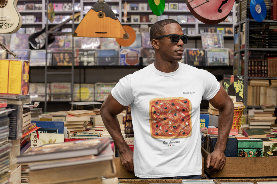man in a records store wearing sardenara t-shirt