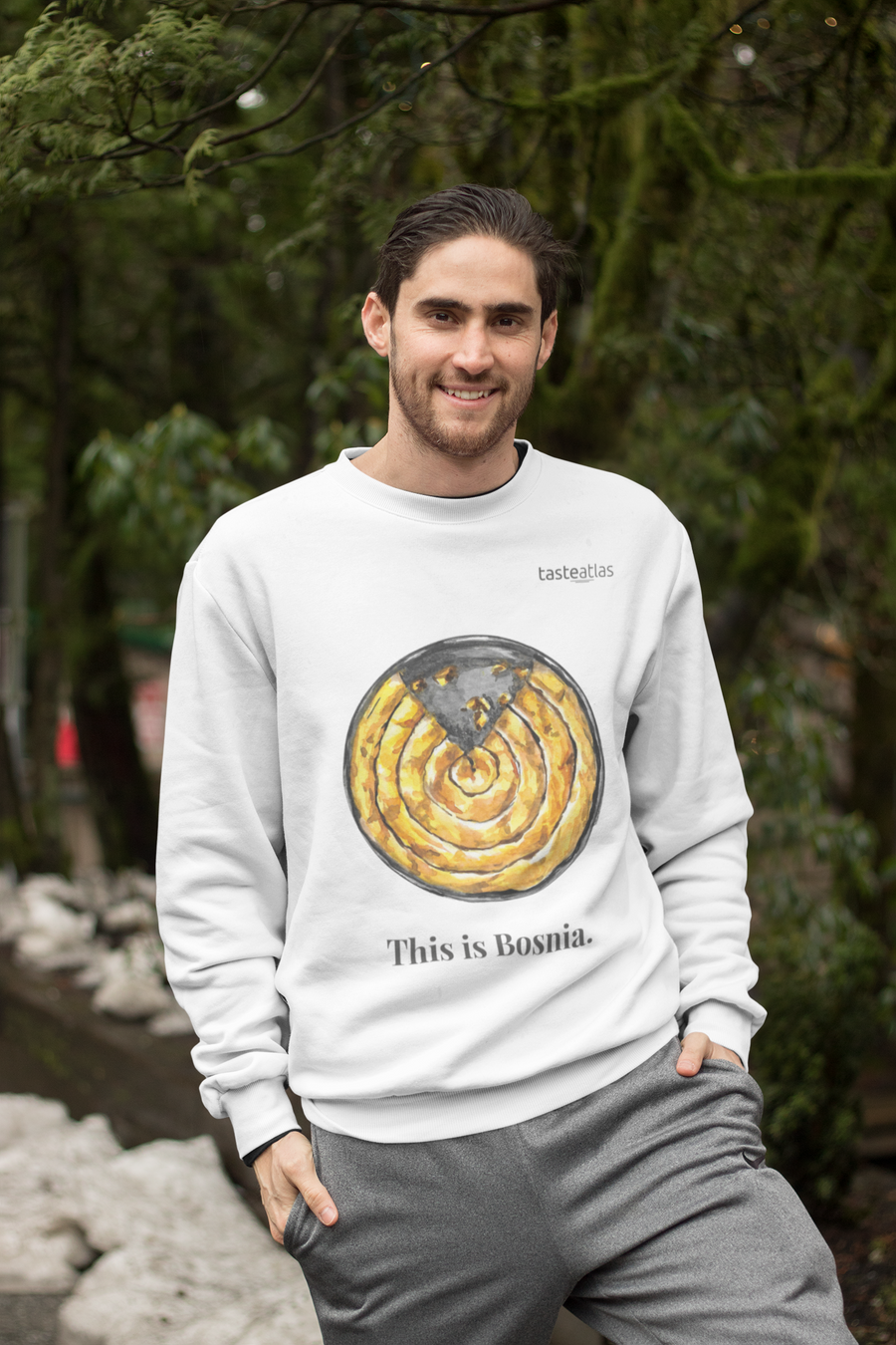 man in a park wearing this is Bosnia sweatshirt