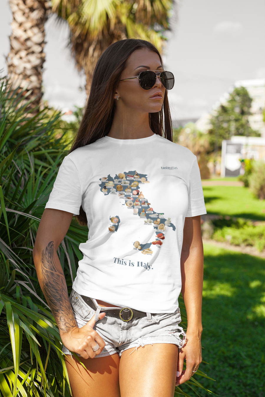 a woman in a park waering this is italy antipasti t shirt